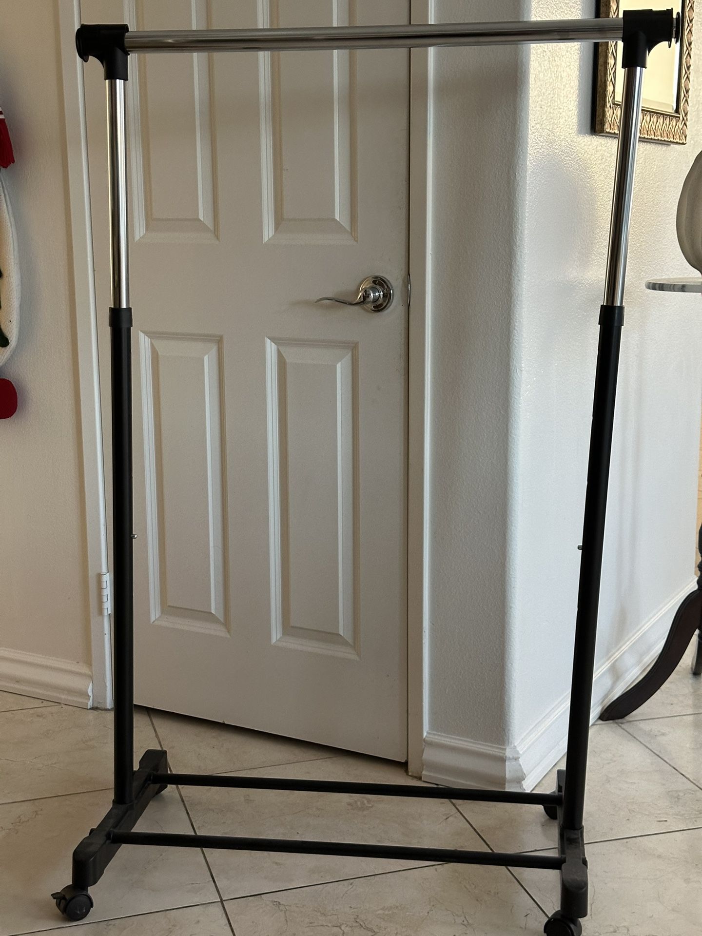 Free Clothes Rolling Rack (pending Pickup)