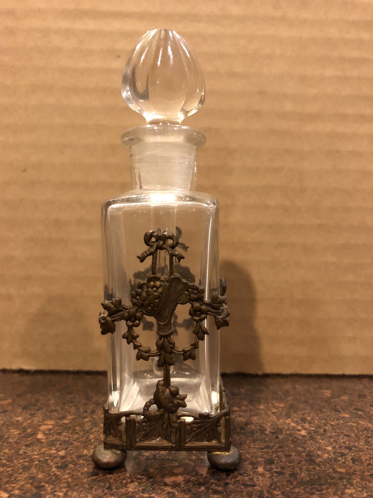 Antique Apollo Studios perfume bottle and holder