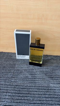 The image shows a vintage 4 FL. OZ. (120 ml) splash bottle of Eau de Calandre by Paco Rabanne (Eau de Toilette), released originally starting in 1969.