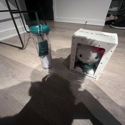 Hello kitty plushie and cup 