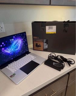 ASUS ROG Zephyrus G16 AI Gaming Laptop 16.0" 240Hz AMOLED WQXGA Display (AMD Ryzen AI 9 HX 370, GeForce RTX 4070 8GB, 32GB LPDDR5X, 2TB PCIe SSD, RGB 