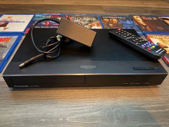 Panasonic dp -ub450 Blu Ray 4k player with movie lot