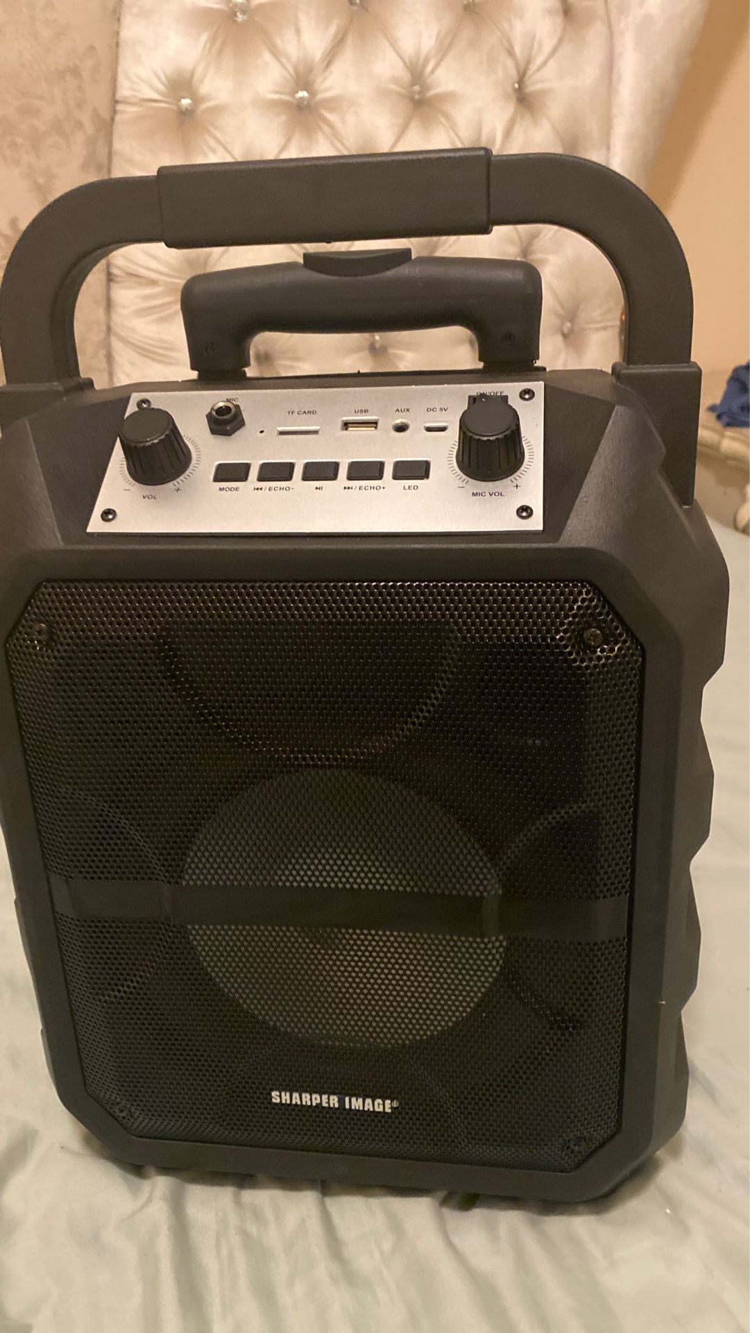 Sharper image speaker with microphone