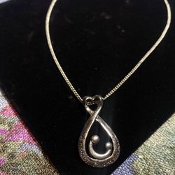 “A MOTHER'S LOVE IS FOREVER" PENDANT NECKLACE