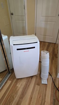 Portable air conditioner by honeywell MN10CESWW 10,000 BTU in excellent working condition