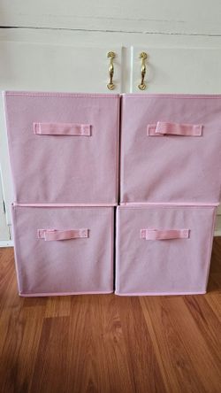 Pink cloth storage bins
