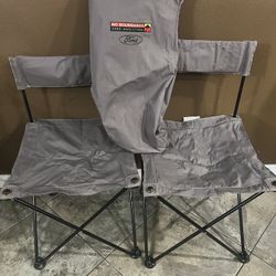 Two Ford Outfitters No Boundaries Explorer Sport Trac camp chairs. The perfect addition for tailgating or camping trips, these chairs come with a hand