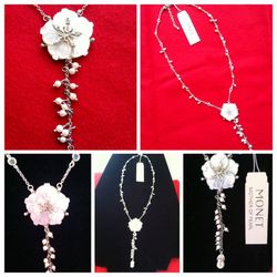 Made in China / MONET Mother of Pearl white flower necklace . Delicate design and very pretty .