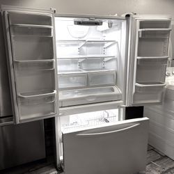 A Kitchen Aid White Refrigerator 