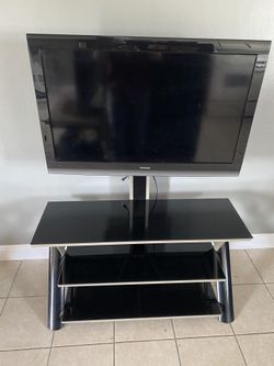 TV stand. Tv included if interested