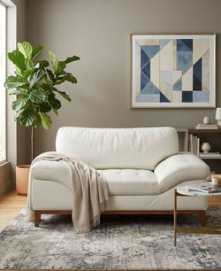 White leather decorative loveseat/couch/chair. Will deliver