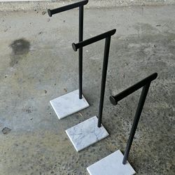 3 Marble toilet paper holder.