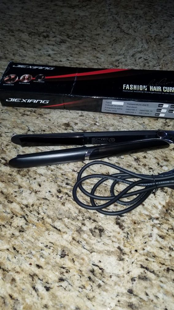 Flat iron. New!Curls or staightens