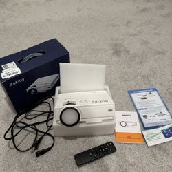 AuKing Projector, Mini Projector, Full HD 1080P Home Theater Video Projector
