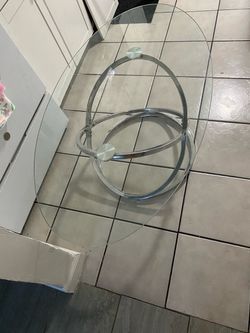 Glass coffee table with chrome base
