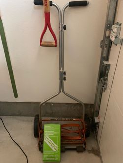 Push lawnmower with blade sharpener kit