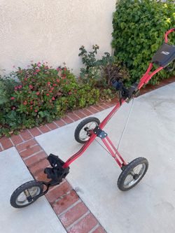 Golf push cart (BagBoy) good condition,3 wheels,cup holder and brake work fine