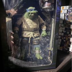 Two Neca Action Figures