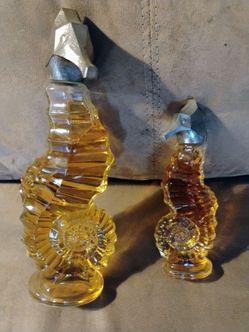 2 Vintage AVON glass Sea horses bottles