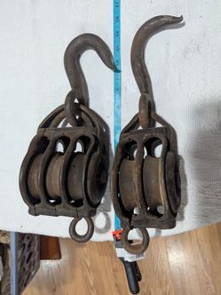 Vintage cast iron block and tackle pulleys