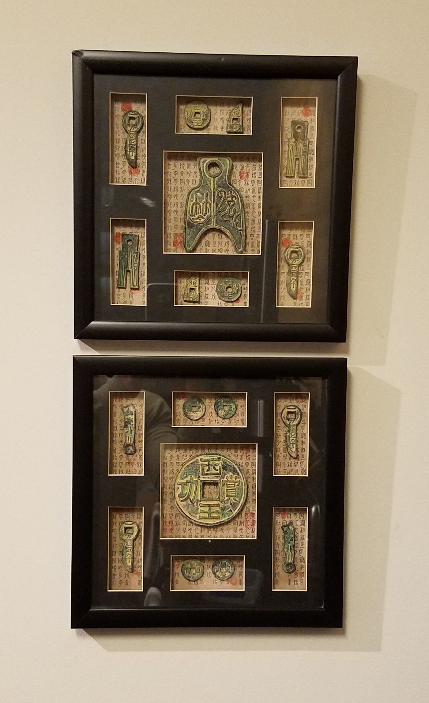 Framed displays of replica Chinese artifacts