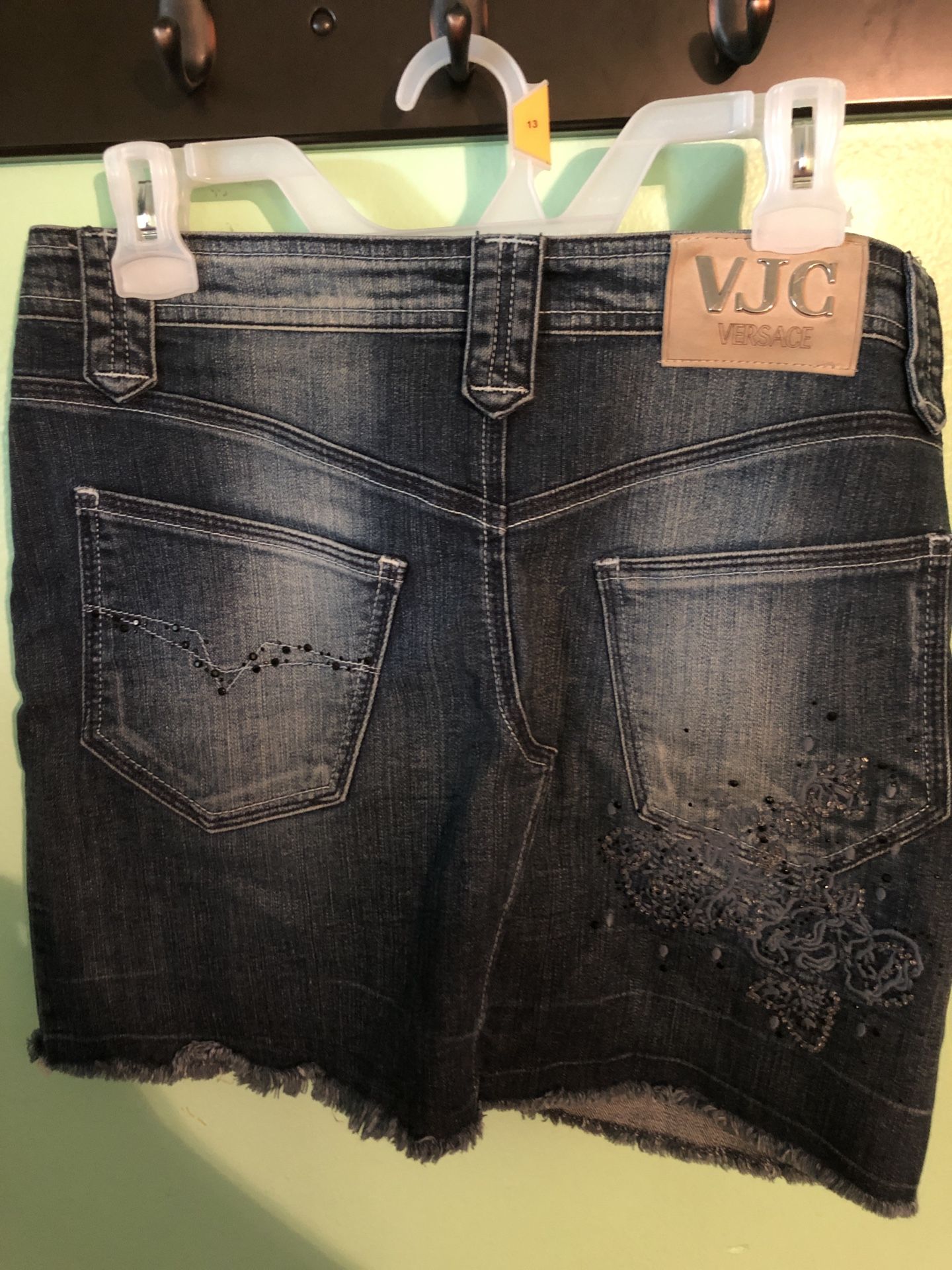 Elegant Jeans skirt. Versace brand. Size (28) M-L. Made in Italy. $60 new women's dress with original lace trim.