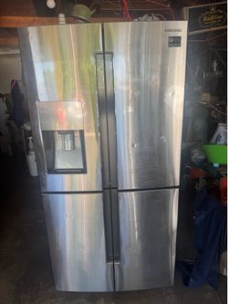 Samsung RF23J9011SR/AA refrigerator — a 4-door French door “FlexZone” counter-depth fridge