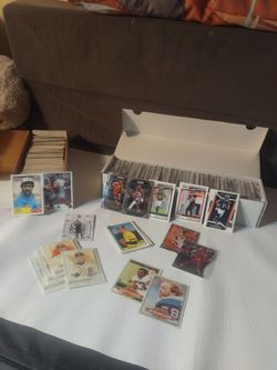 Two boxes of mixed baseball basketball football cards