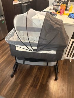 Baby Bassinet with Canopy and Wheels