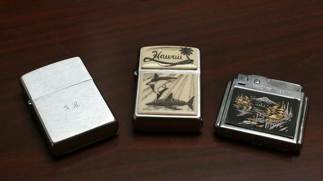 Zippo Lighters, and Sarome "Oscar" Lighter $15 for shark lighter.