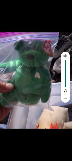 Ty beanie baby "Erin the bear" with tag error.