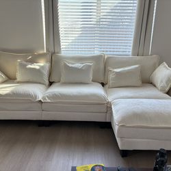 1-Year-Old Cream L-Shaped Sectional w/ Movable Ottoman