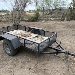 Pull behind trailer with ramp and gate