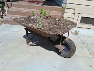 Vintage wheelbarrow planter