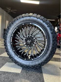 20x10 Chevy Ford GMC off road rims and tires 33x12.50r20