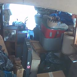 Carport Full Of Different Items