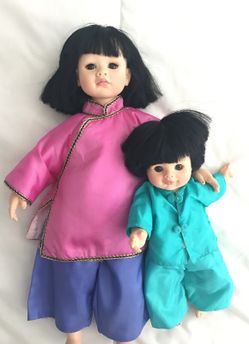 Dolls by Pauline , Siblings , display shelved lightly used , collectors addition