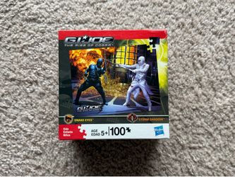 G.I. Joe: The Rise of Cobra 100-piece jigsaw puzzle featuring Snake Eyes and Storm Shadow