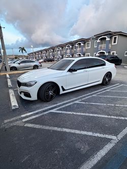 BMW 7 Series White Sedan M Sportclean