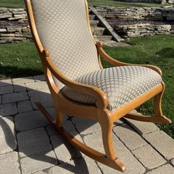 vintage upholstered cushioned rocking chair