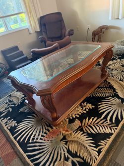 Wood coffee table with glass