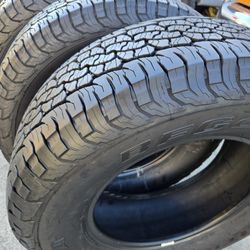 4.  PCS OF TIRES.    BFGOODDRICH  TRAIL TERRAIN  T/A.    SIZE 265/70/17