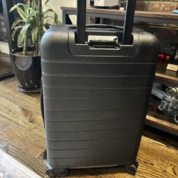 Away bigger carry on with Portable Charger Included  (jet Black)  