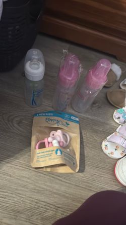 Dr. Brown bottles and pacifiers brand new