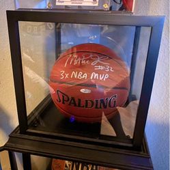 Magic Johnson autographed basketball. Signature and 3X NBA MVP.