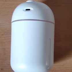 New And Never Used USB Plug Humidifier & Diffuser With LED Night Light
