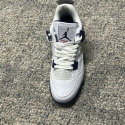 Midnight Navy Jordan 4s 