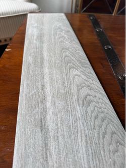 Gray porcelain tile. 484 sqft