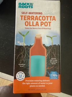 Self-watering pot for plants