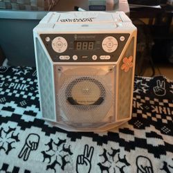White medium sized CD karaoke machine